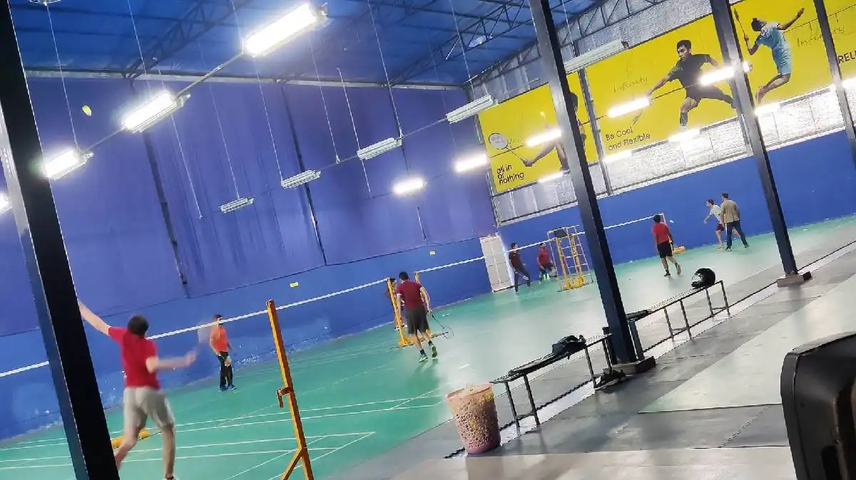 Badminton court at InfinityS Badminton Academy Palam Vihar in Bajhera Road, New Palam Vihar Marg, near Baba Prakash Puri Ashram, Gurugram, Haryana 122017 - Professional badminton courts for weekend games and tournaments