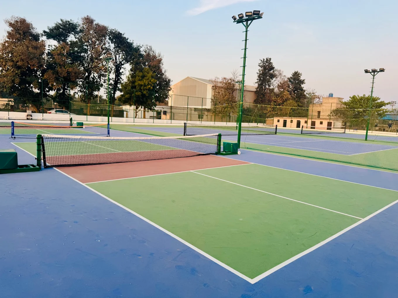 Badminton court at SportsLane Pickleball Tennis and Badminton Arena in Grand Arch, behind Ireo, Ghatta Kanarpur, Sector 58, Gurugram, Ghata, Haryana 122018 - Professional badminton courts for weekend games and tournaments