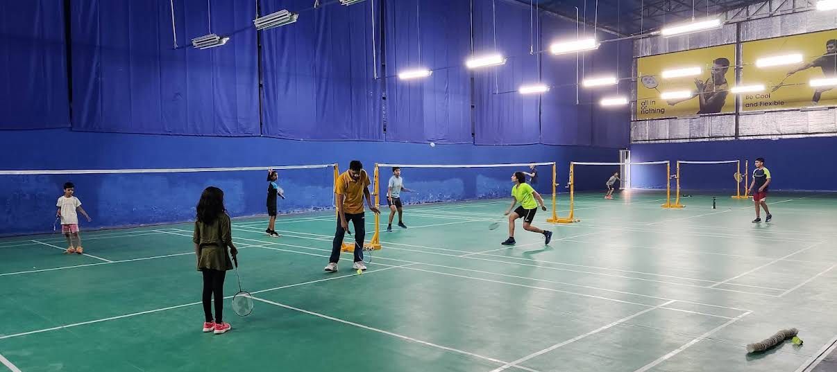 Badminton court at InfinityS Badminton Academy Sec 110 in Bajhera Road, New Palam Vihar Marg, near Baba Prakash Puri Ashram, Gurugram, Haryana 122001 - Professional badminton courts for weekend games and tournaments